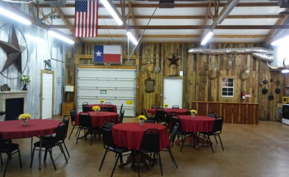 Rustic Texas event hall with round tables